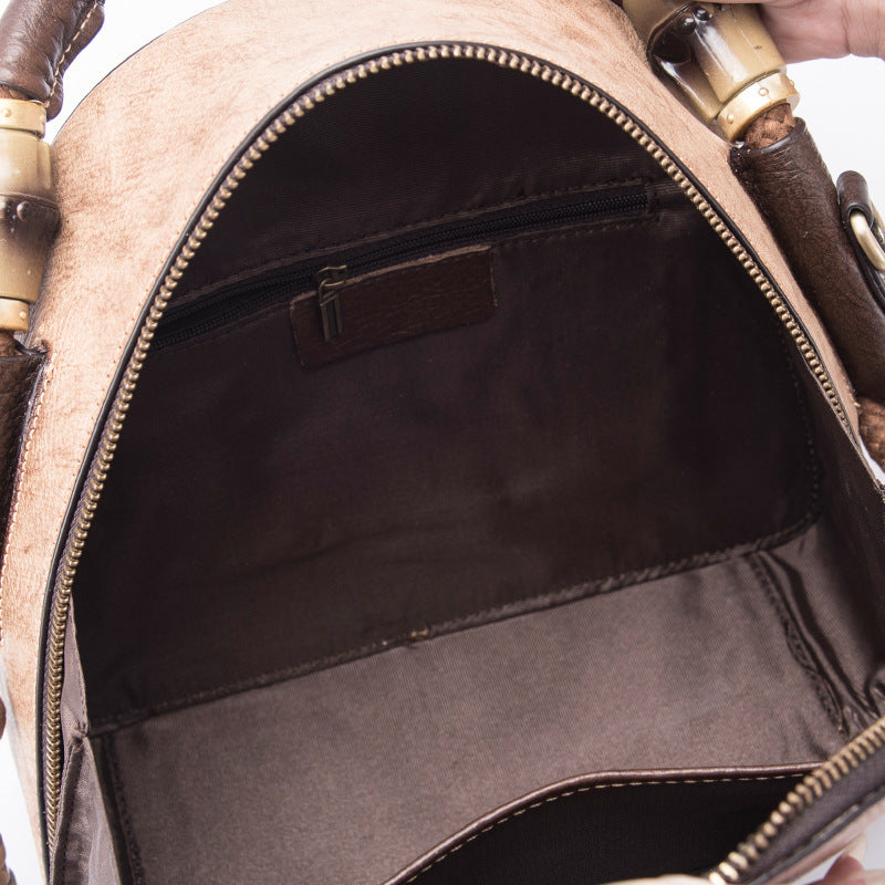 Handmade Retro Leather Bag – Genuine Cowhide Floral Round Handbag for Women